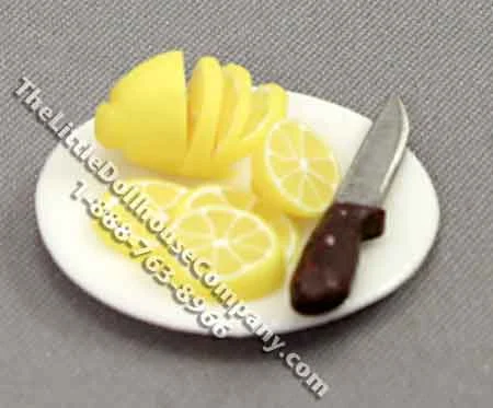 Miniature Sliced Lemon on a Plate by Charlotte Willmott