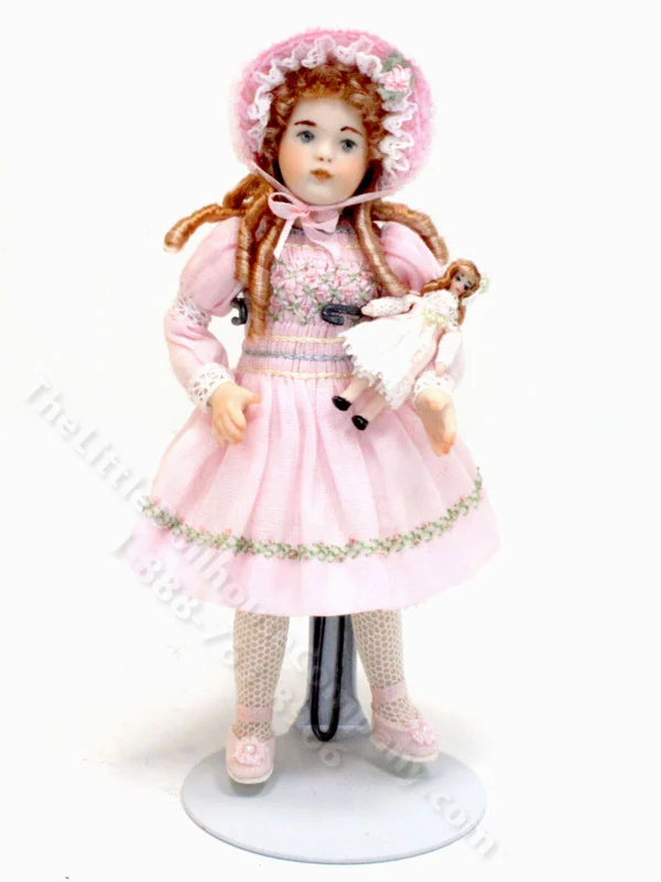 Porcelain Doll in Pink Dress with Doll