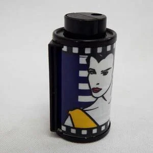 Vintage 35mm film shaped piezo pocket lighter